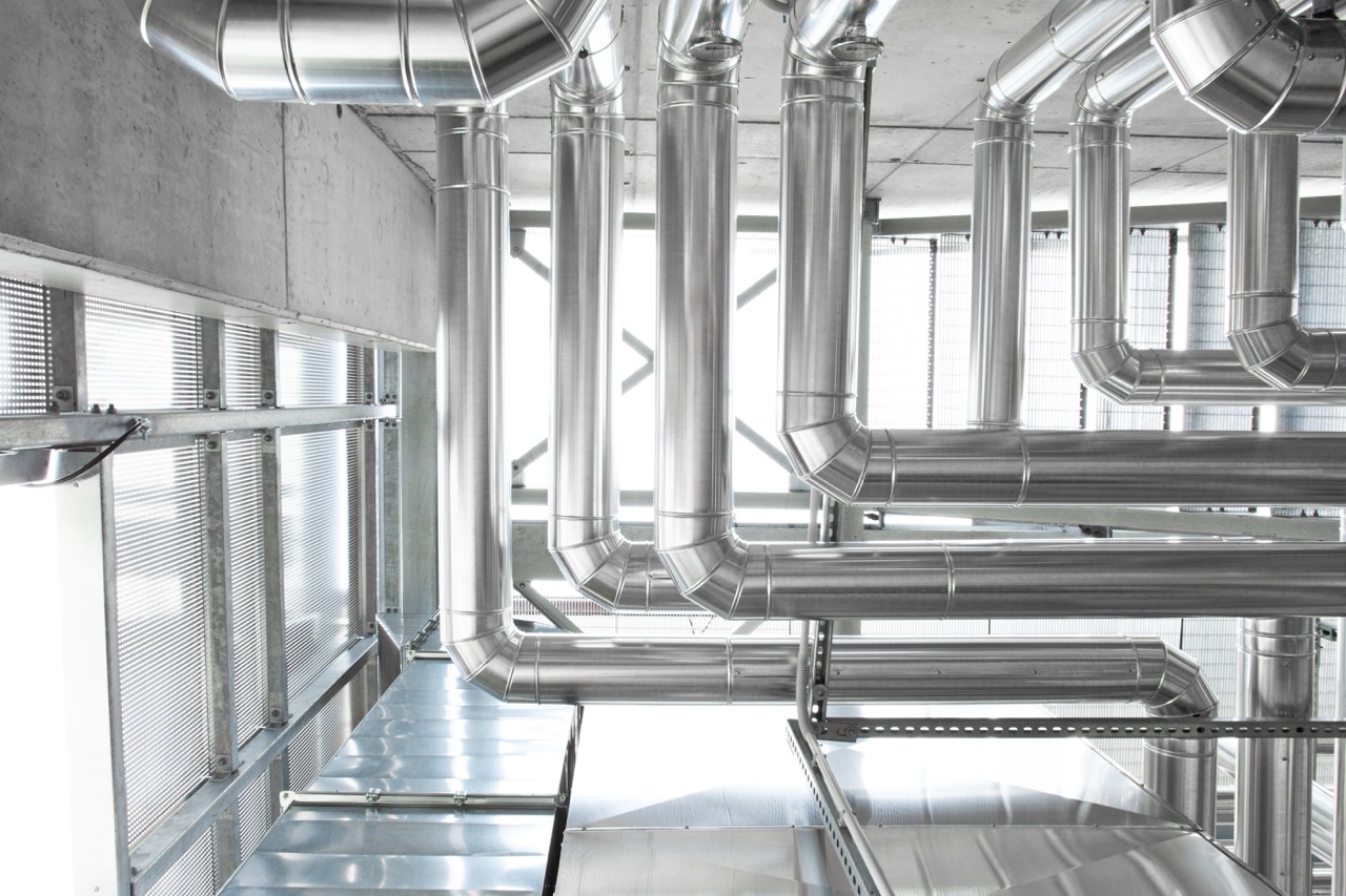 Hvac pipes, heating, ventilation, air conditioning and cooling system, ventilation system ducted through the wall located outside. Climate system for room comfort of building